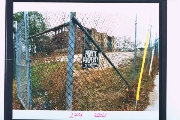 fence bordered vacant lot sporting a private property no tresspassing sign, formerly the site of the apartment bldg where serial killer cannibal jeffrey dahmer resided mutilated his victims photo by steve kagangetty images