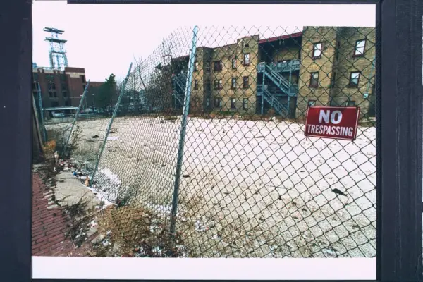 fence bordered vacant lot sporting a no tresspassing sign, formerly the site of the apartment bldg where serial killer cannibal jeffrey dahmer resided mutilated his victims photo by steve kagangetty images