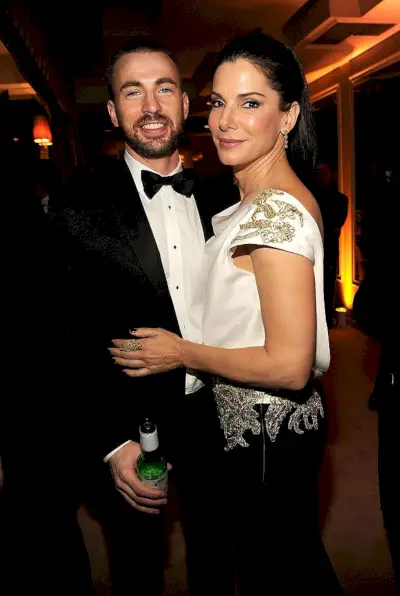 west hollywood, ca february 26 exclusive access special rates apply no north american on air broadcast until march 1, 2012 chris evans and sandra bullock attend the 2012 vanity fair oscar party hosted by graydon carter at sunset tower on february 26, 2012 in west hollywood, california photo by kevin mazurvf12wireimage