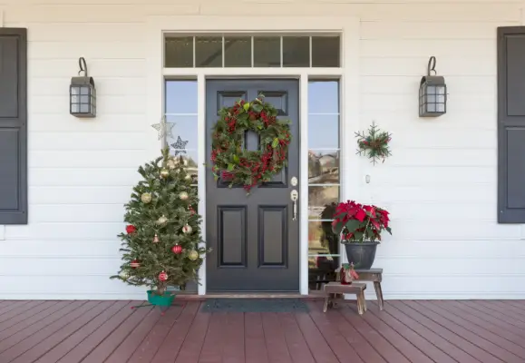 christmas decorations at front door of house