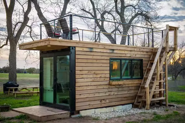 Wood paneled rectangular tiny home