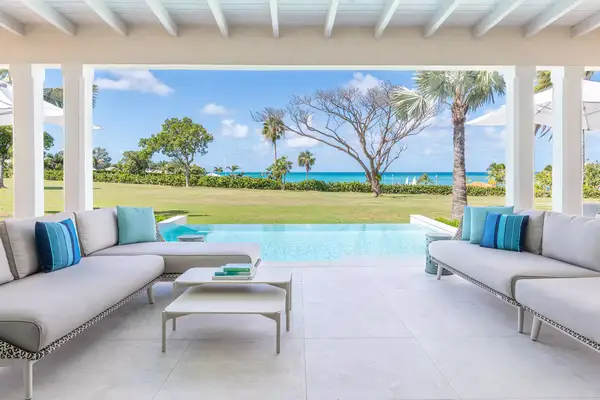 View of beach and plunge pool from private guest room