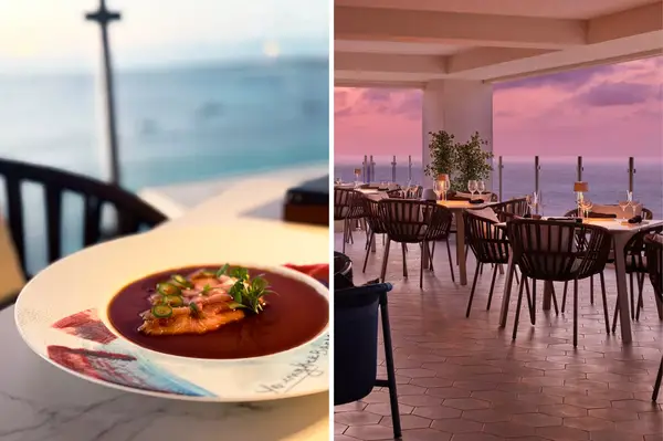 A plated dish and a restaurant patio with an ocean view at sunset