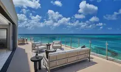 Outdoor terrace with seating overlooking the ocean