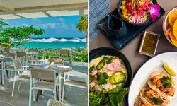 Outdoor dining area with ocean view, spread of dishes including tacos and poke bowl