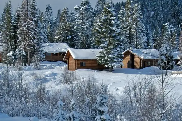 Cabins under snow at Cooper Mountain Resort