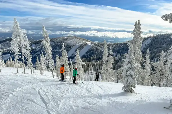 Three people on a ski run in Idaho
