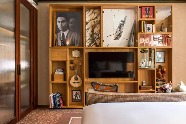 A decorated shelf in a hotel room. 
