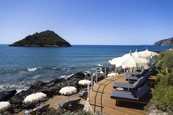 Lounge chairs overlooking the water in Italy
