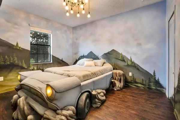 Interior of a bedroom at the Wizards Way by Loma Homes-Champions Gate, Florida, United States