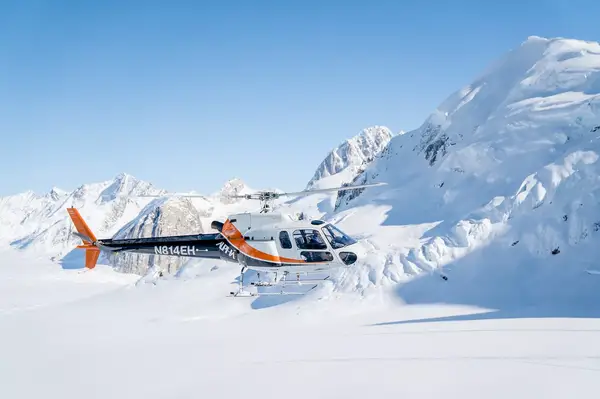 The helicopter bringing guests to the Sheldon Chalet