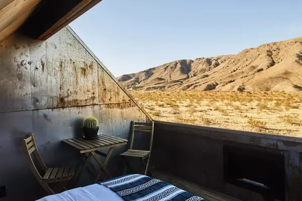 Outdoor bed and dining table in the desert