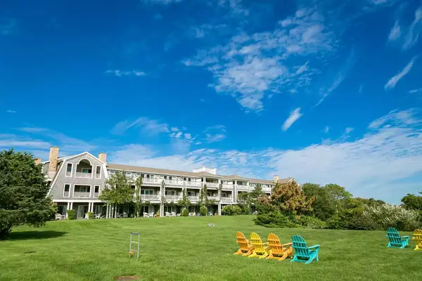 Lawn with lawn chairs outside The Winnetu