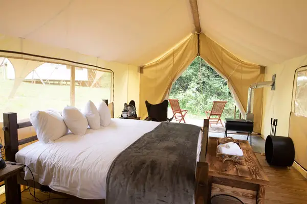 Bed in a canvas tent 