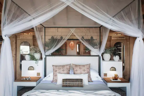 A guest room bed at Lovango Resort + Beach Club, St. Joh