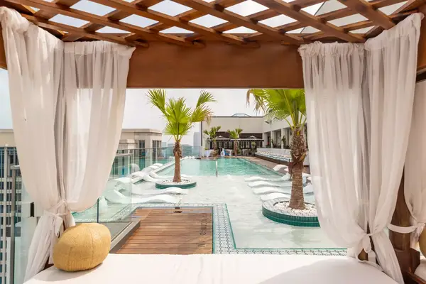 View of rooftop pool from private cabana at Hotel Swexan