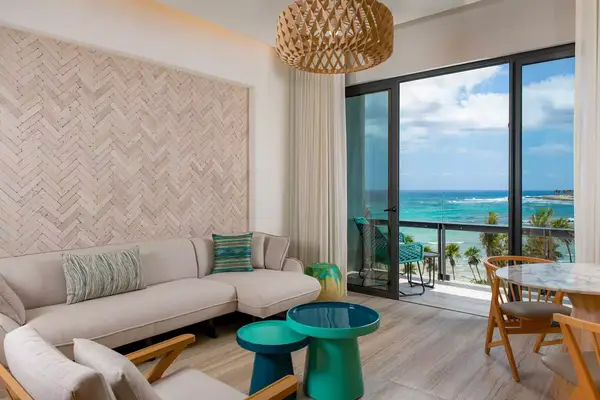 Interior suite living space at Hilton Tulum