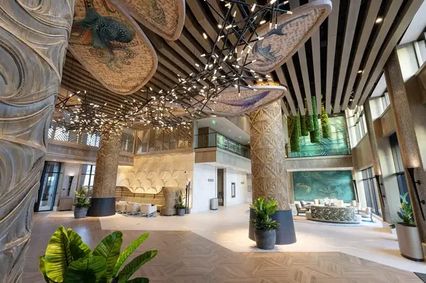 Interior view of the Polynesian resort lobby showcasing decorative columns and art