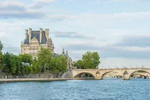 People strolling the seine in Paris