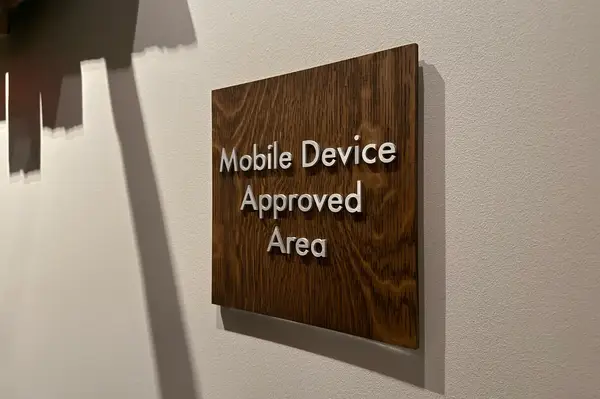 A wooden wall sign with the text 