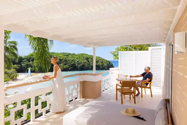 A couple on a patio at Couples San Souci