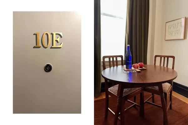 Guest room doors painted with NYC style apartment numbers and a simple wooden table in the room