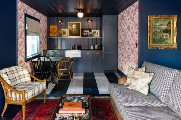 A cozy cabin interior with maximalist decor in a vintage style. Noble + Proper at Big Bear Lake in California