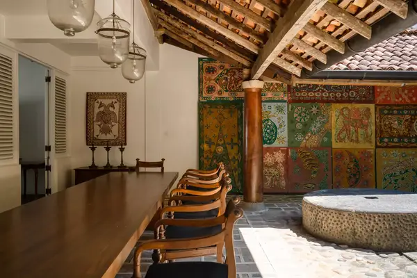 Interior of a home in Sri Lanka with batik panels on the wall