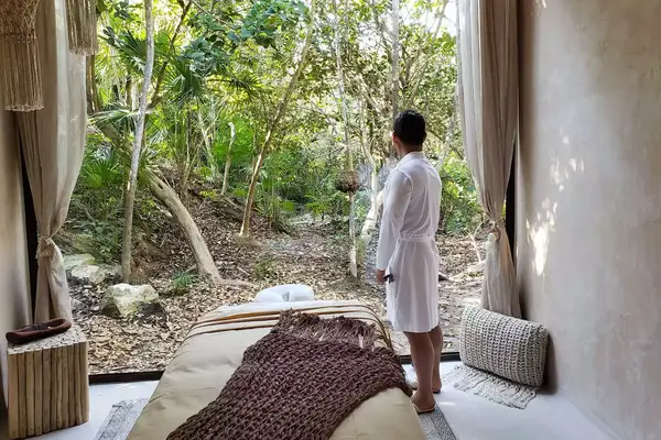 Guest Jimmy Im in a spa treatment room at Palmaia, the house of AIA resort in Mexico