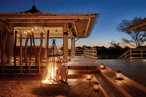 A fire-lit terrace at Belmond Savute Elephant Lodge, voted one of the best hotels in the world
