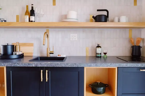 Interior space of king bedroom with kitchenette at Azure Sky hotel in Palm Springs