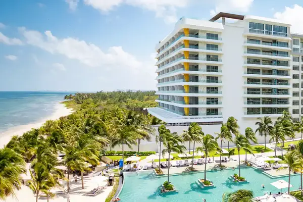 Exterior of pool and beach at the Hotel Mousai Cancun