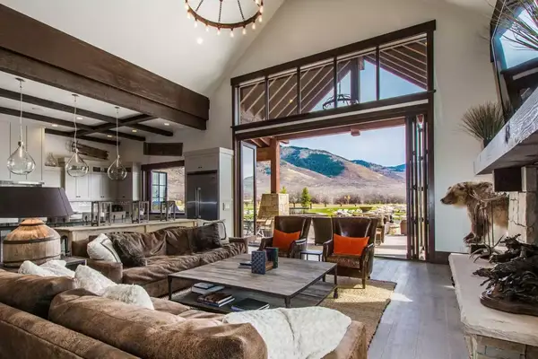 Living room with view of mountains in the window