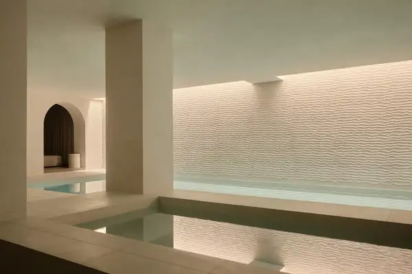 Indoor spa pool area with a relaxing ambiance and minimalistic design