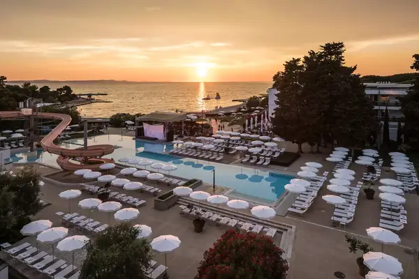 Aerial view of the pool and loungers at Falkensteiner Club Funimation Borik