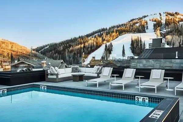 The roofdeck pool and view at Goldener Hirsch
