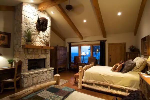 Cabin bedroom interior at Wildcatter Ranch & Resort in Texas