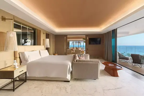 Suite bedroom at SLS Playa Mujeres