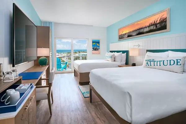 A queen guest room at Margaritaville Beach Resort Fort Myers Beach