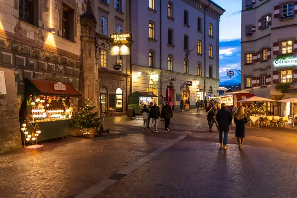 Busy street at night in Innsbruck