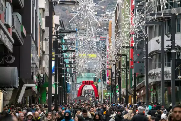 morning in Andorra in the middle of the Pyrenees families corner and driving course on the snow. streets full of Christmas shopping people
