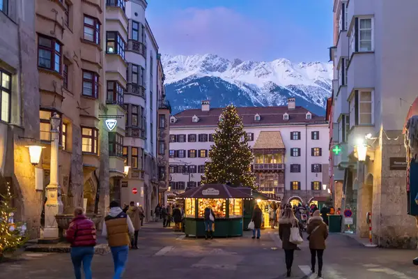 This is a photo of the Christmas market in front of the famous Golden roof in Innsbruck, Austria.