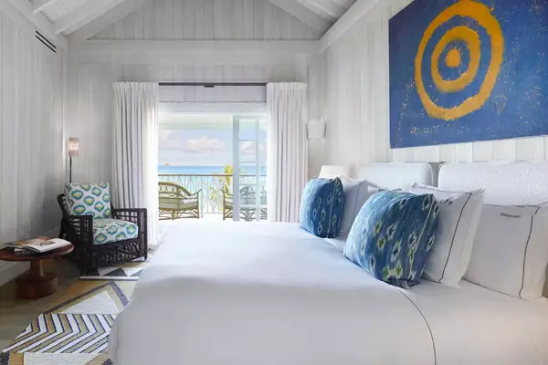 Guest bedroom interior with ocean view Cheval Blanc St-Barth Isle de France 