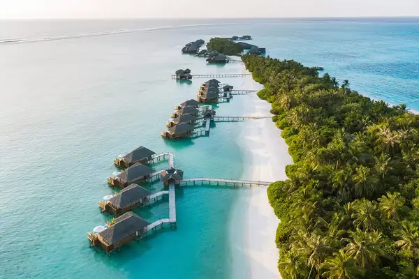 Aerial view of over water bungalows at Conrad Maldives Rangali Island