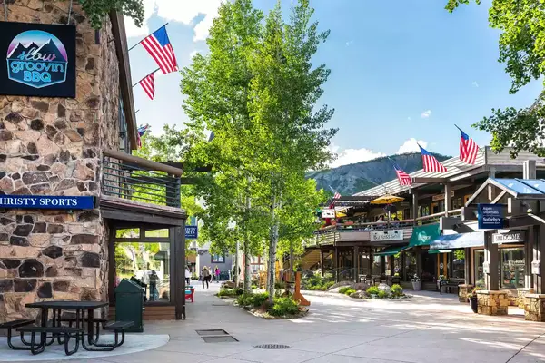Snowmass village town city with strip shopping mall in Colorado downtown