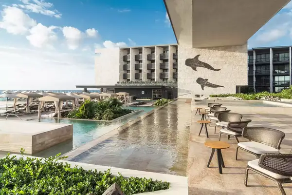 Patio overlooking pool and beach area
