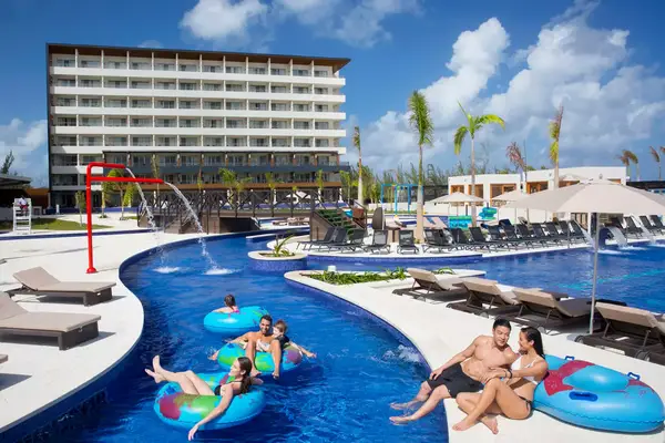 Family in the pool at a hotel