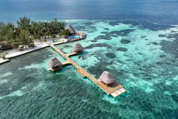 Overwater docks at Coco Plum Island Resort