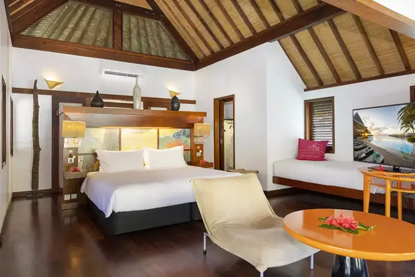 Interior of an overwater bungalows at Sofitel Kia Ora Moorea
