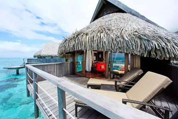 Exterior view of an overwater bungalow at Sofitel Kia Ora Moorea